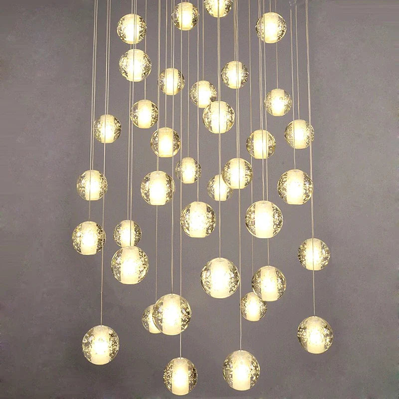Lustre boule en cristal avec LED rotatives et suspension moderne