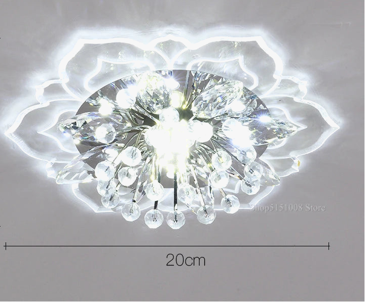 Lustre boule en cristal avec fleurs, éclairage coloré pour intérieur.